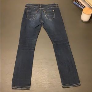 Delia’s distressed knee Jayden skinny jeans
